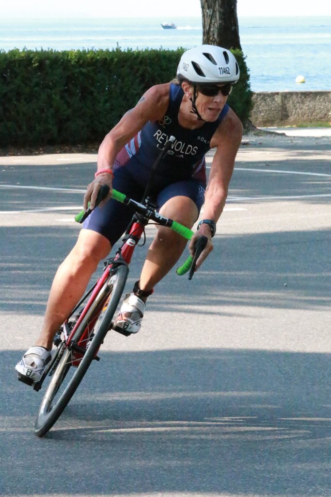 Reynolds cornering on the bike at a triathlon in Lausanne in 2019